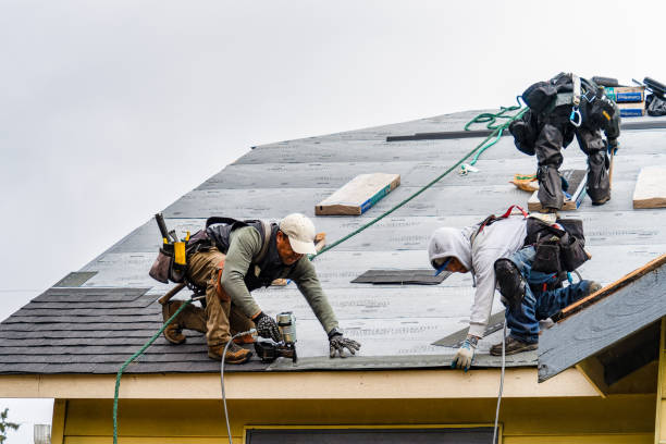 Professional Gutter Installation technician working in Kent, WA
